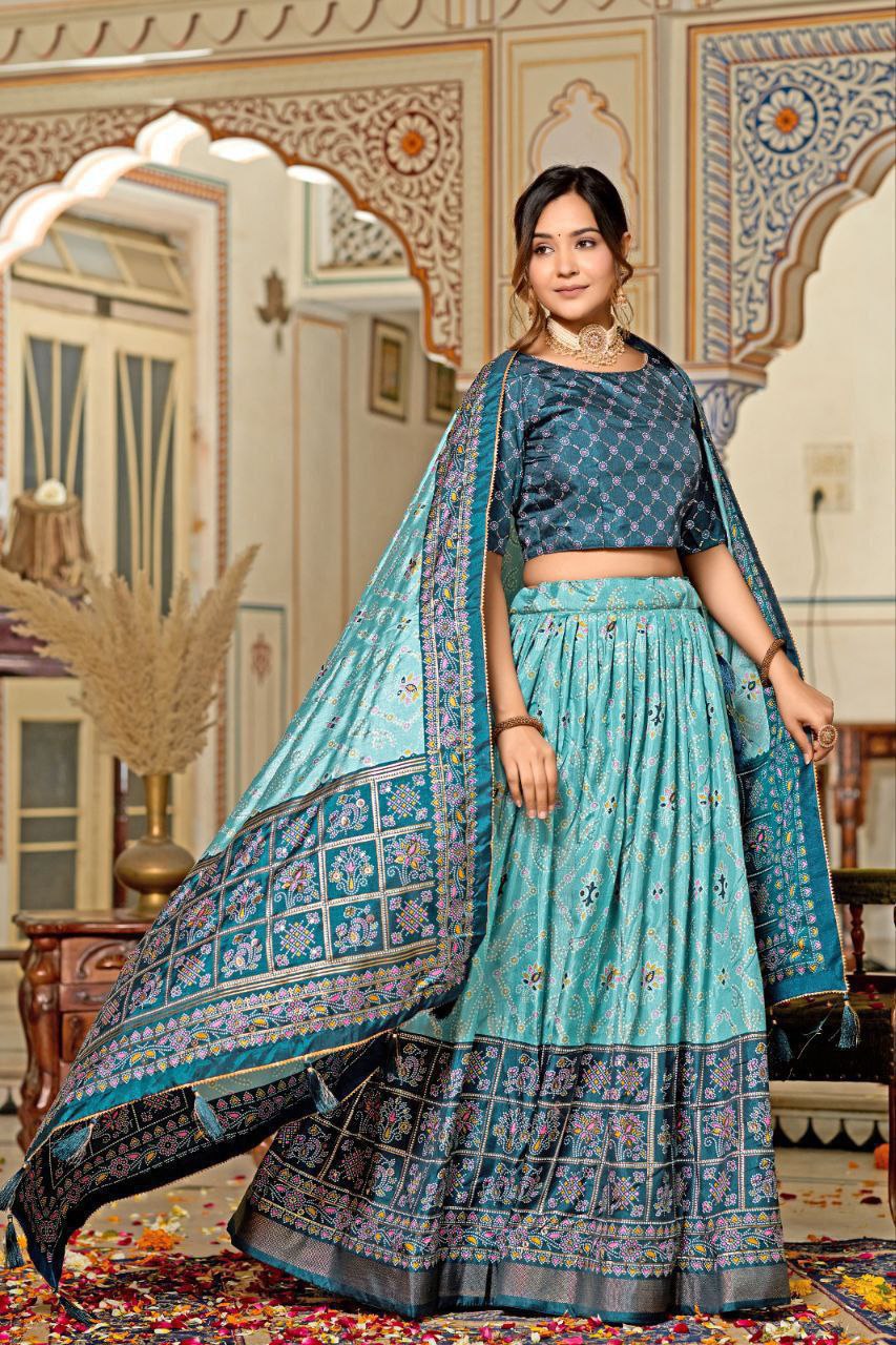 Embrace the elegance of Dola Silk, where tradition meets contemporary style in every printed lehenga choli